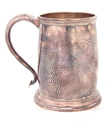 Lot 184 - A GEORGE V SILVER PINT MUG of tapering footed...