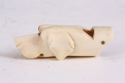 Lot 575 - A VICTORIAN IVORY DOG WHISTLE in the form of a...