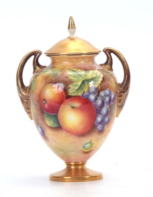 Lot 32 - LEAMAN. A ROYAL WORCESTER GILT TWO-HANDLED...