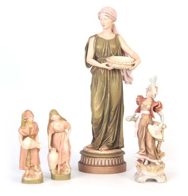 Lot 61 - A GROUP OF FOUR ROYAL DUX STANDING FIGURINES...