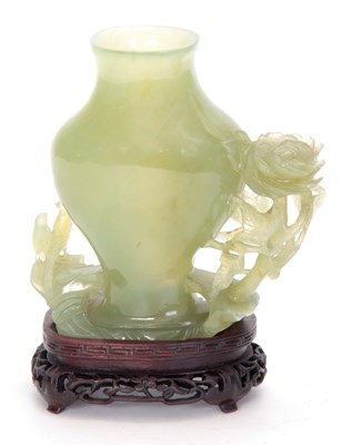 Lot 152 - A 19TH CENTURY CHINESE JADE VASE ON HARDWOOD...