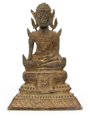 Lot 171 - A TIBETAN BRONZE SEATED BUDDHA 14cm high.