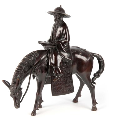 Lot 187 - A CHINESE BRONZE SCULPTURE OF A SCHOLAR RIDING...