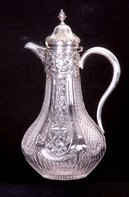 Lot 268 - A VICTORIAN SILVER MOUNTED CUT GLASS CLARET...