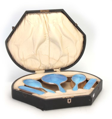 Lot 298 - A GEORGE V CASED SILVER AND BLUE ENAMEL FIVE...