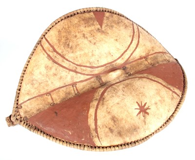 Lot 342 - AN AFRICAN HIDE CHIEFTAIN'S SHIELD with bound...