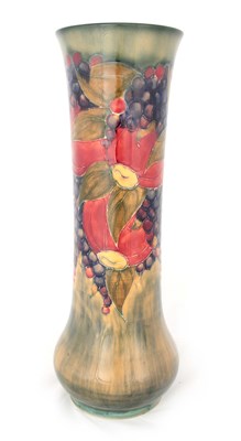 Lot 36 - AN EARLY WILLIAM MOORCROFT FLARED TALL SLENDER...