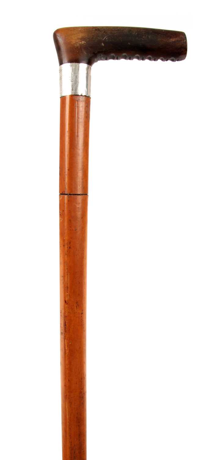 Lot 361 - A 19TH CENTURY MALACCA CANE SWORD STICK with...