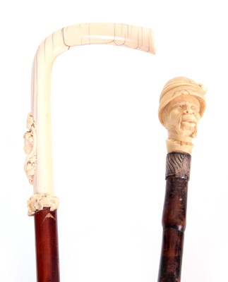 Lot 363 - TWO LATE 19TH CENTURY IVORY HANDLED WALKING...