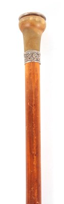 Lot 378 - A 19TH CENTURY MALACCA CANE WALKING STICK WITH...