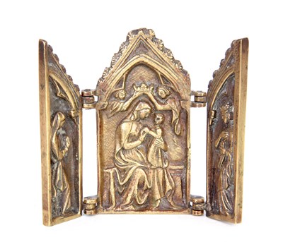 Lot 510 - A GOTHIC STYLE CAST BRASS TRAVELLING TRIPTYCH...