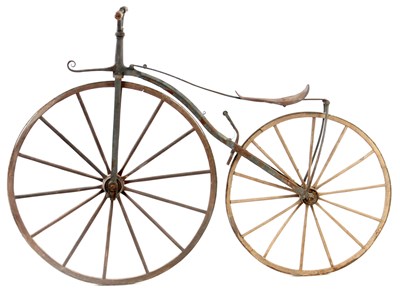 Lot 544 - A MID 19TH CENTURY "BONESHAKER" BICYCLE having...