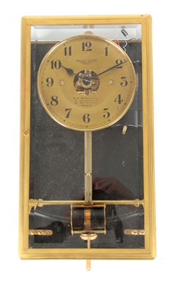 Lot 697 - A 1930's FRENCH BULLE ELECTRIC WALL CLOCK the...