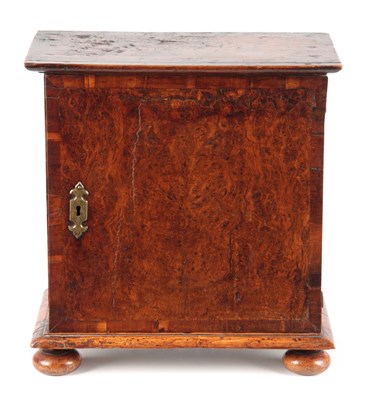 Lot 782 - A LATE 17TH CENTURY ELM SPICE CABINET with...