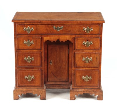 Lot 788 - A GEORGE I INLAID WALNUT KNEEHOLE DESK the...