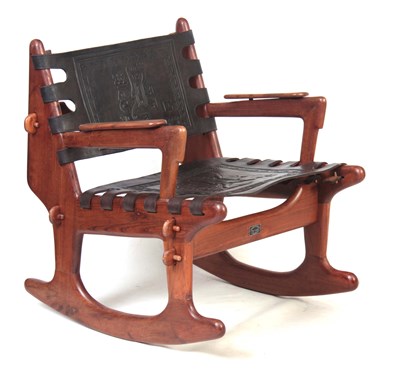 Lot 827 - A 20TH CENTURY TEAK ROCKING CHAIR BY ANGEL...