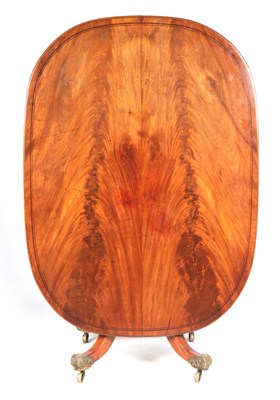 Lot 866 - A REGENCY FLAME MAHOGANY TILT-TOP TABLE with...