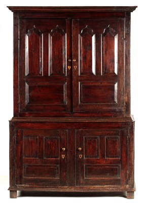 Lot 873 - A MID 18TH CENTURY OAK PRESS CUPBOARD with...