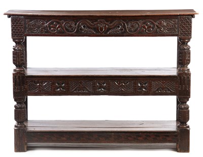 Lot 900 - A 19TH CENTURY CARVED OAK BUFFET IN THE 17TH...