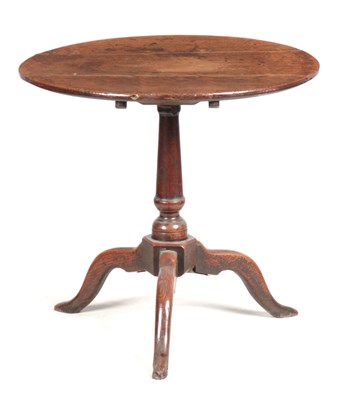 Lot 910 - AN UNUSUAL EARLY 18TH CENTURY OAK TILT TOP...