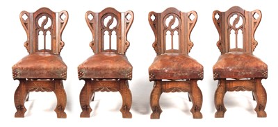 Lot 925 - A SET OF FOUR ARTS AND CRAFTS GOTHIC STYLE OAK...