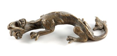 Lot 612c - A SMALL BRONZE DRAGON 10cm long.