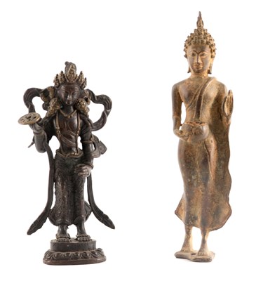 Lot 138 - AN ORIENTAL BRONZE FIGURE OF A DEITY 24cm high...