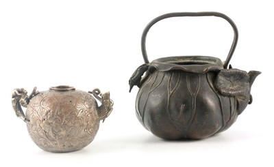 Lot 142 - AN EARLY CHINESE PATINATED BRONZE TEAPOT...