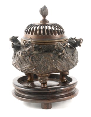 Lot 145 - A 19TH CENTURY CHINESE BRONZE CENSER with dome-...