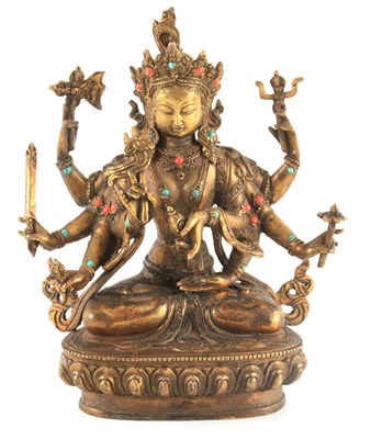 Lot 151 - A TIBETAN GILT BRONZE BUDDHA inset with coral...