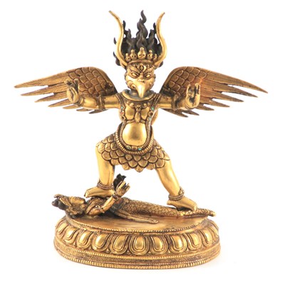 Lot 152 - A 19TH CENTURY TIBETAN GILT BRONZE SCULPTURE...