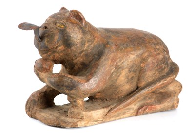 Lot 157 - AN UNUSUAL EASTERN CARVED WOOD SCULPTURE OF A...