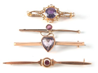 Lot 176 - A COLLECTION OF FOUR 9CT GOLD AND AMETHYST BAR...