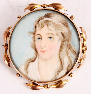 Lot 557 - A VICTORIAN CIRCULAR MINIATURE BUST PORTRAIT...