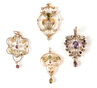 Lot 197 - A COLLECTION OF FOUR ART NOUVEAU GOLD PENDANTS...