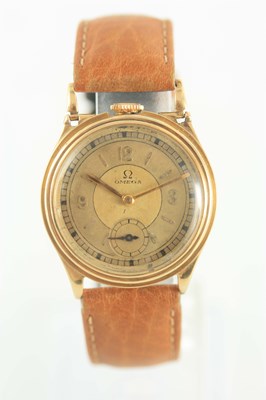 Lot 224 - AN UNUSUAL GOLD 1930'S TOP WINDING OMEGA WRIST...