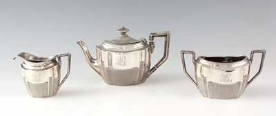 Lot 239 - A LATE VICTORIAN SILVER THREE PIECE TEA...