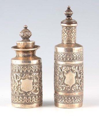 Lot 245 - TWO EASTERN SILVER METAL BOTTLES AND STOPPERS...