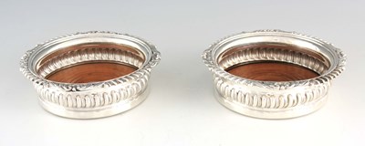 Lot 259 - A PAIR OF GEORGE IV CRESTED SILVER WINE...