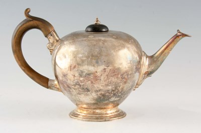 Lot 264 - A VICTORIAN SILVER TEAPOT of bulbous form with...