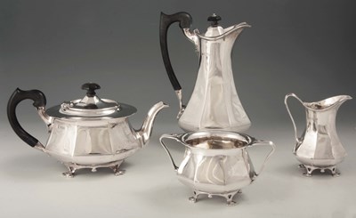 Lot 274 - A GEORGE V ART NOUVEAU SILVER FOUR-PIECE TEA...