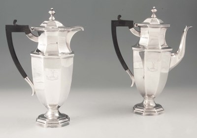 Lot 280 - A PAIR OF GEORGE V SILVER COFFEE AND TEAPOTS...