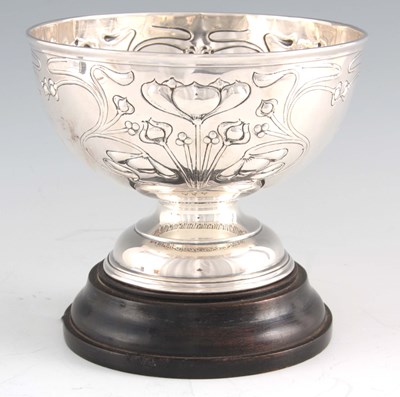 Lot 292 - AN EDWARD VII ART NOUVEAU EMBOSSED SILVER...