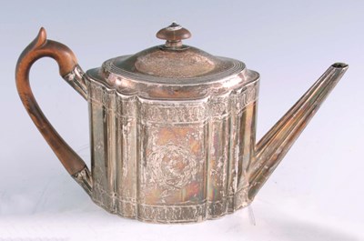 Lot 322 - A GEORGE III SILVER TEAPOT of oblate fluted...