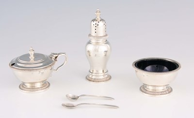 Lot 329 - AN ELIZABETH II THREE-PIECE SILVER CRUET SET...