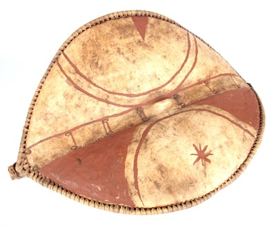 Lot 384 - AN AFRICAN HIDE CHIEFTAIN'S SHIELD with bound...