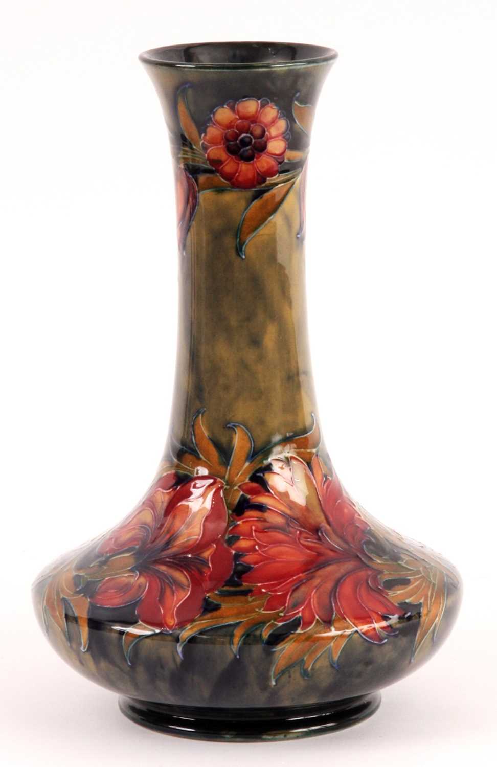 Lot 64 - A WILLIAM MOORCROFT VASE tube lined and...