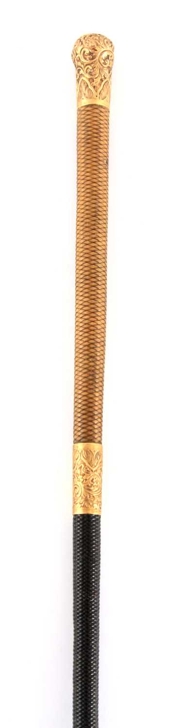 Lot 442 - A 19TH CENTURY 18CT GOLD MOUNTED RIDING CROP