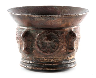 Lot 469 - A 17TH CENTURY BRONZE MORTAR with shaped side...