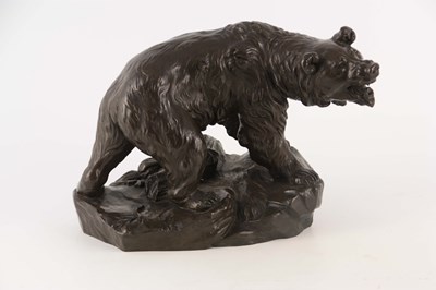 Lot 555 - A BRONZE SCULPTURE OF A WOUNDED BEAR mounted...